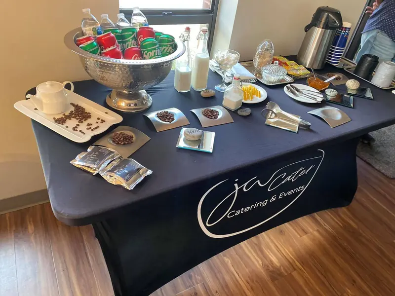 Coffee and snack station on a JW Cater table cover