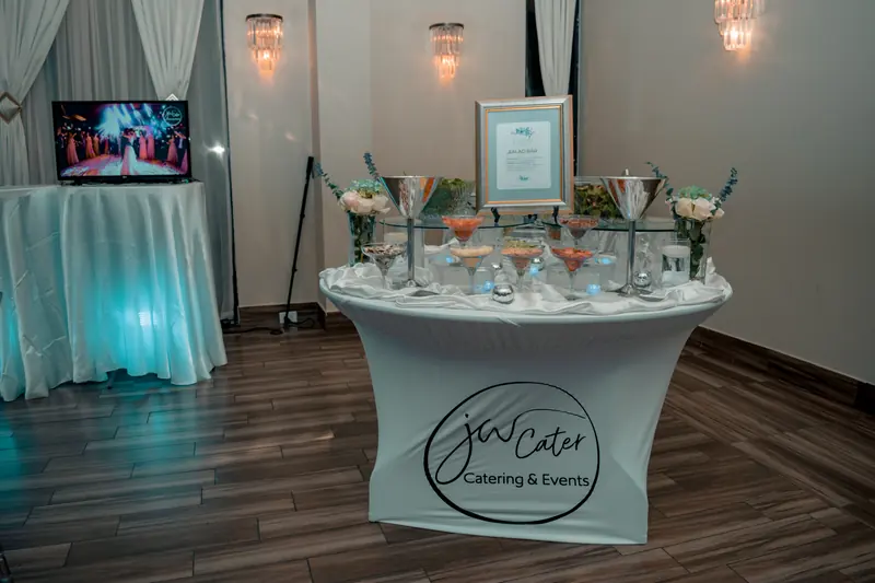 Salad station with martini-glass toppings in a ballroom